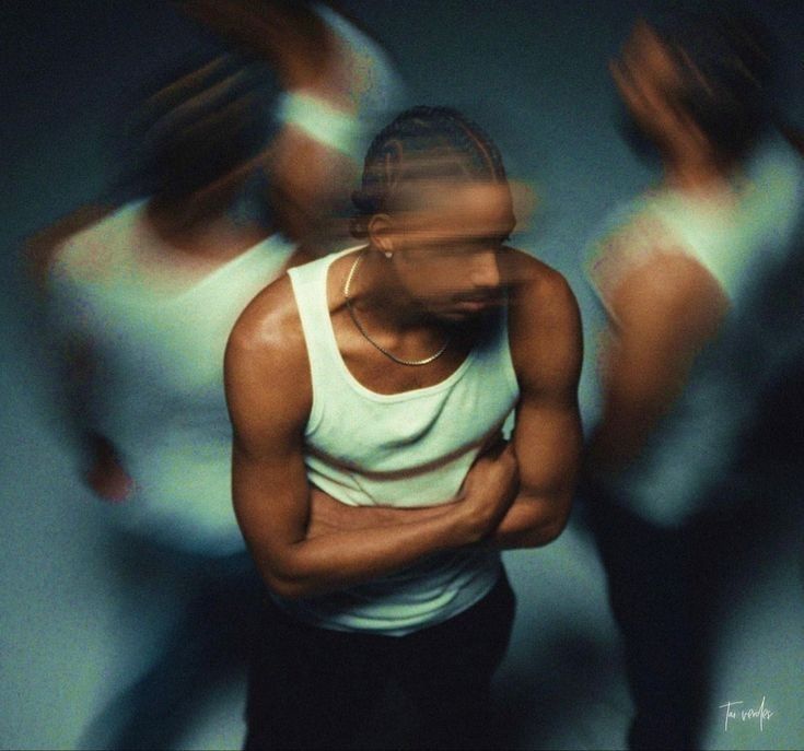 A still portrait surrounded by people in motion